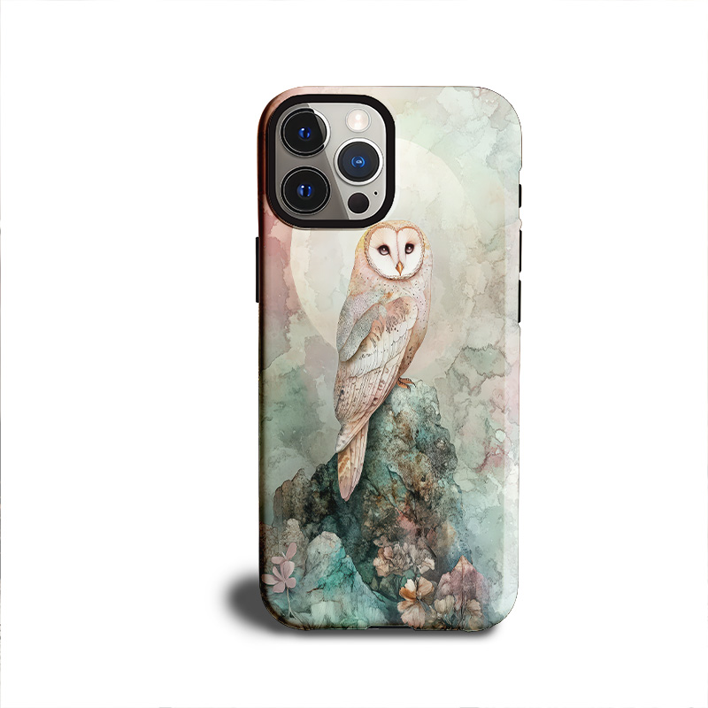 Phone case featuring a watercolor-style barn owl perched on a rock with soft pastel flowers and a glowing full moon in the background.